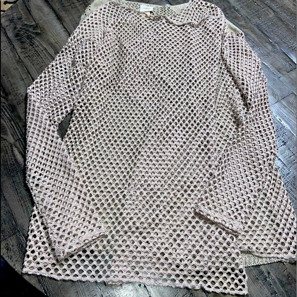 Daytrip long sleeve knit wrap around cardigan. Mid length tan color